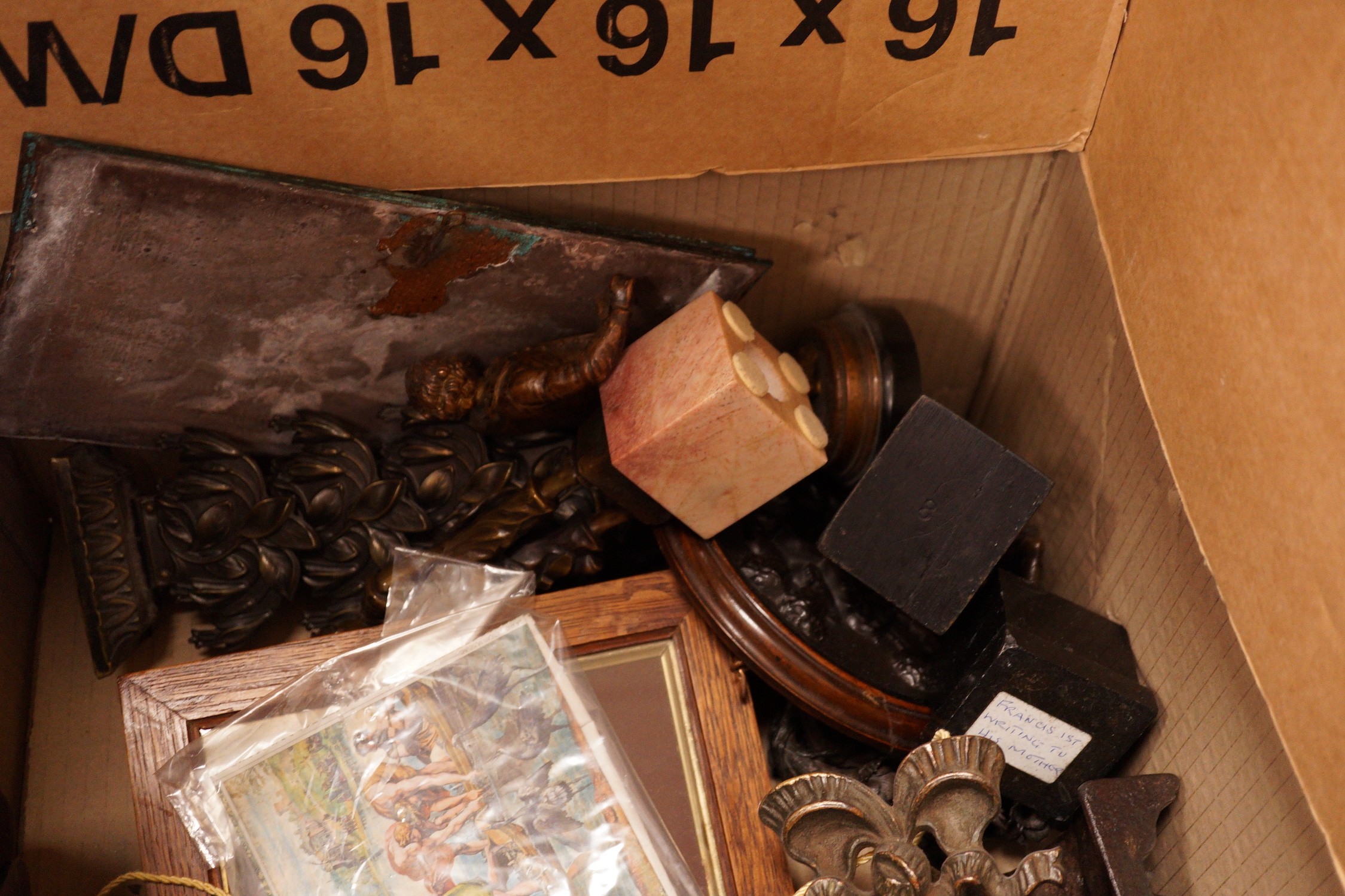 A mixed collection of decorative metalwares, including a gilt brass cherub plaque, a bronze figure of a boy cell signed L Grachner, a spelter figure of a Pierrot etc.